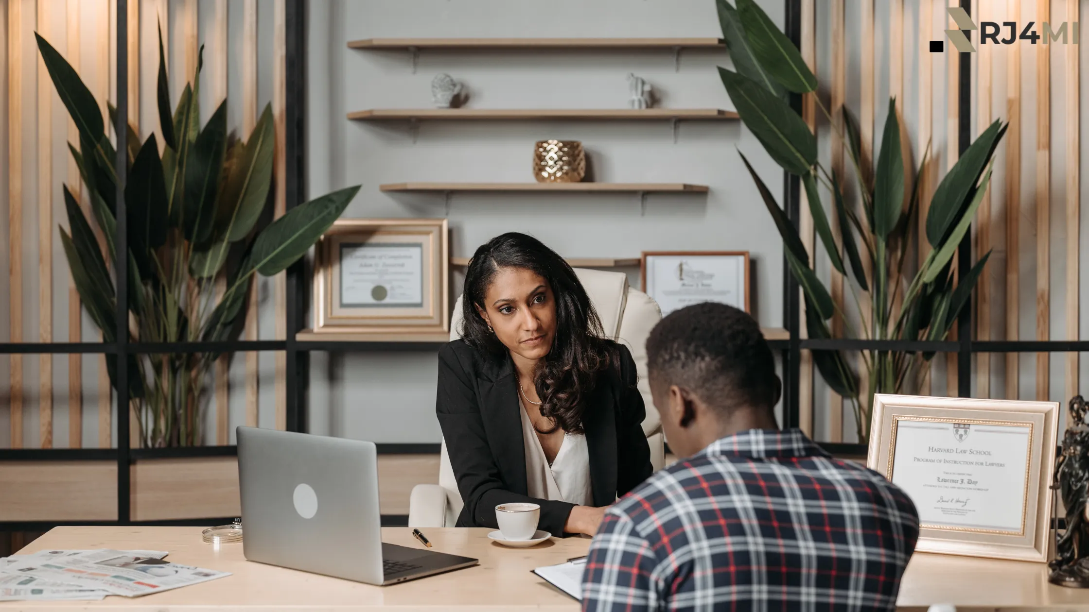 A business expert in a formal office setting attentively listens to a client, emphasizing self-trust and professional decision-making.