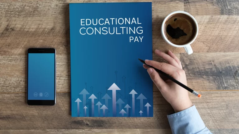 A report titled 'Educational Consulting Pay' with upward arrows, a cup of coffee, and a phone on a desk.