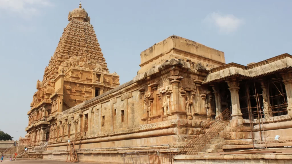 Tanjore temple featured in the Madurai Tanjore travel package showcasing intricate stone carvings and architectural grandeur.